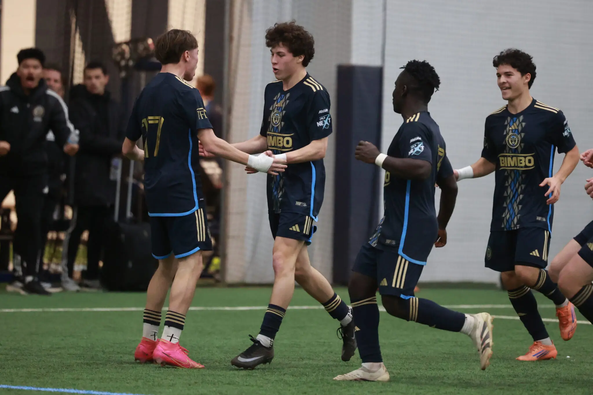 Michael Capretto celebrates a goal for the Union U18s in a 3-1 win over Benfica in the 2026 Snow Bowl