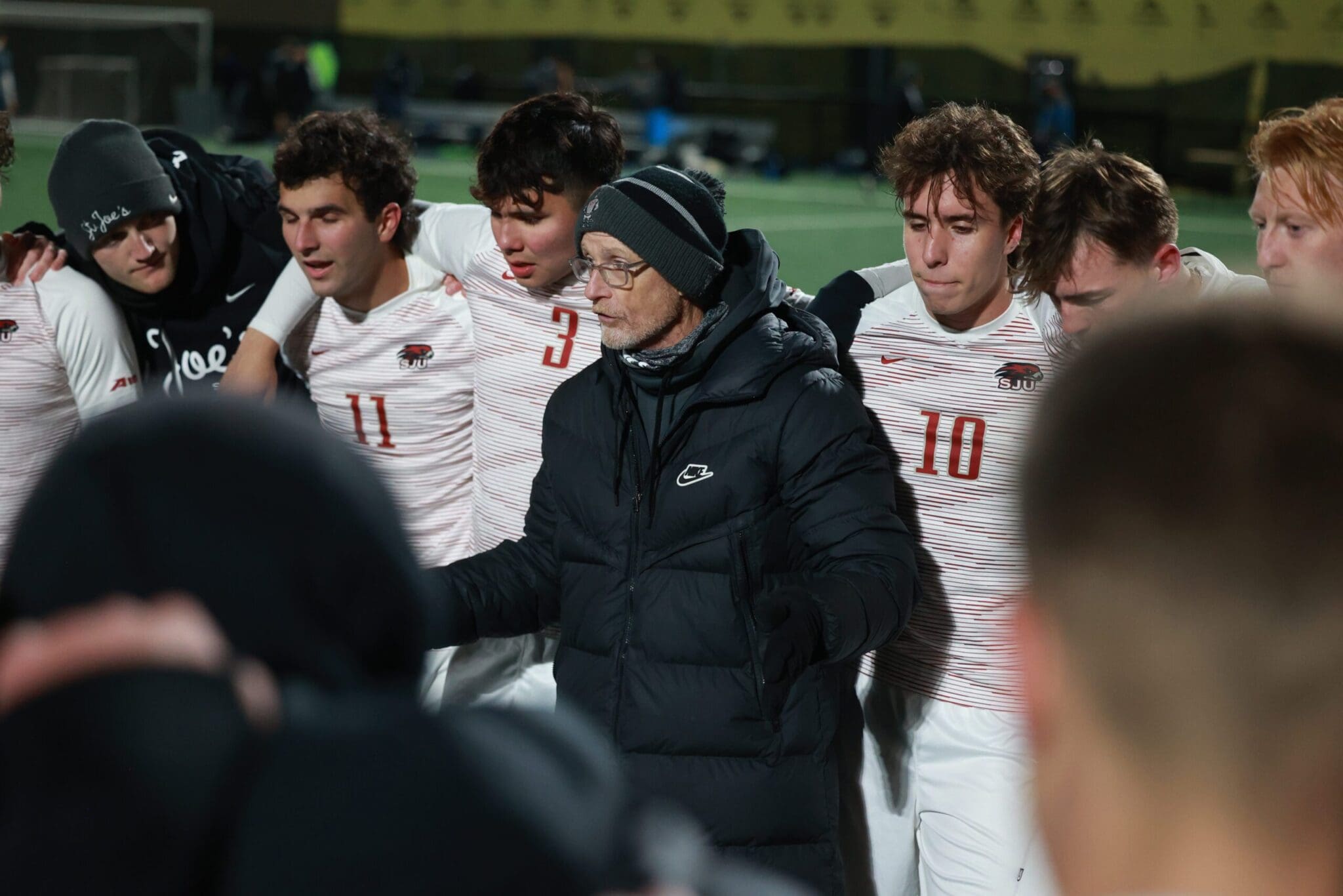 Saint Joseph's head coach Tim Mulqueen talks to his team at the Philly Soccer 6 Cup final at WSFS Bank Sportsplex