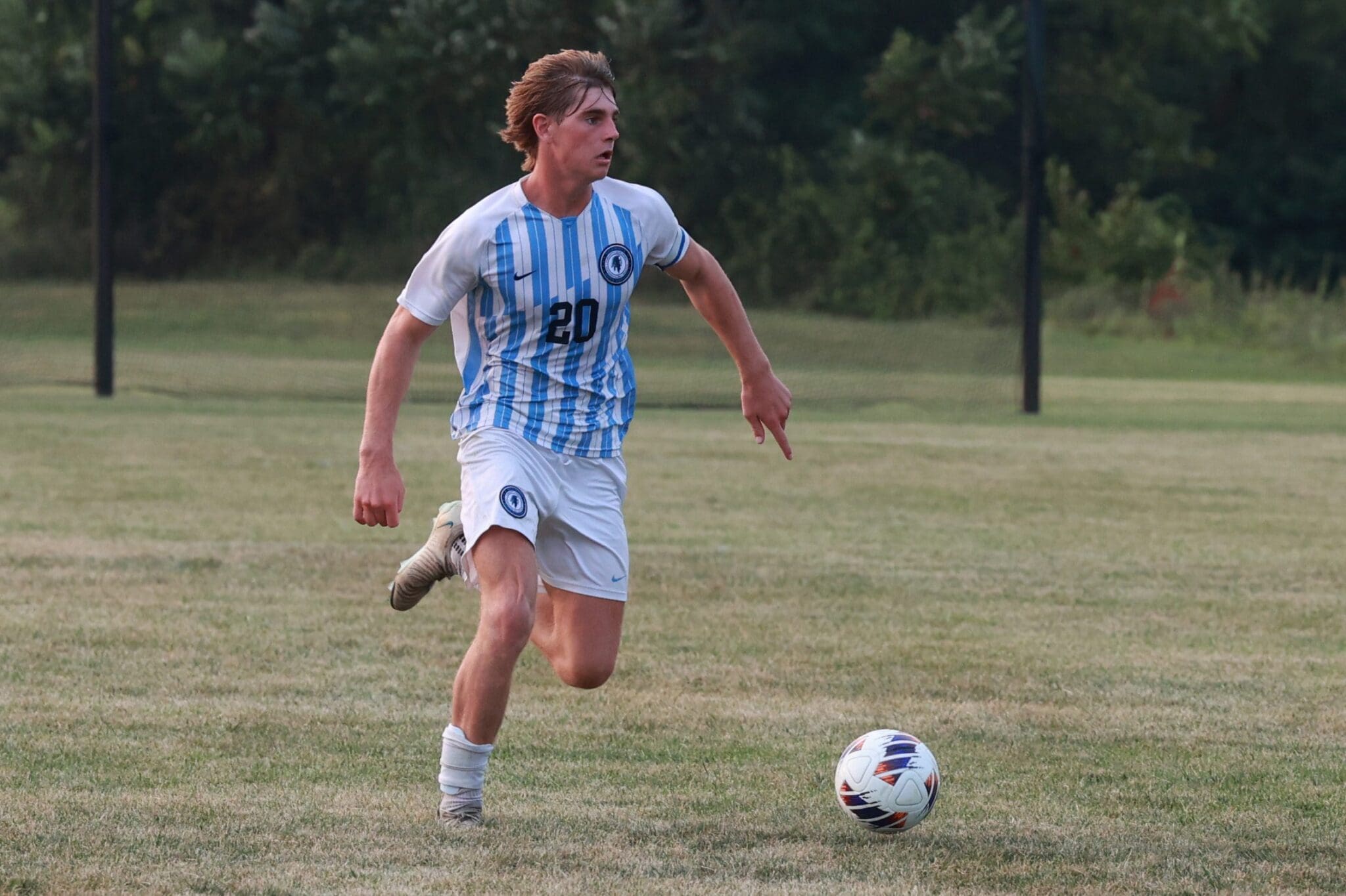 Shawnee defender Darrin Doyle dribbles the ball in a game against Kingsway during the 2025 season