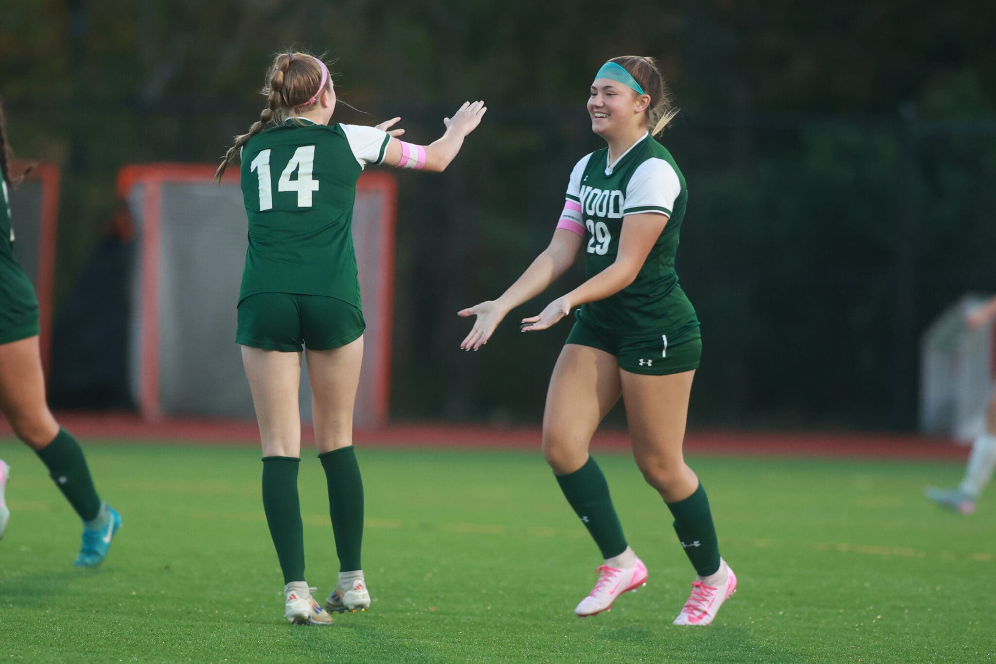 Paige Eckert celebrates with a teammate during the Philadelphia Catholic League semifinal at Gwynned Mercy University on October 21, 2025