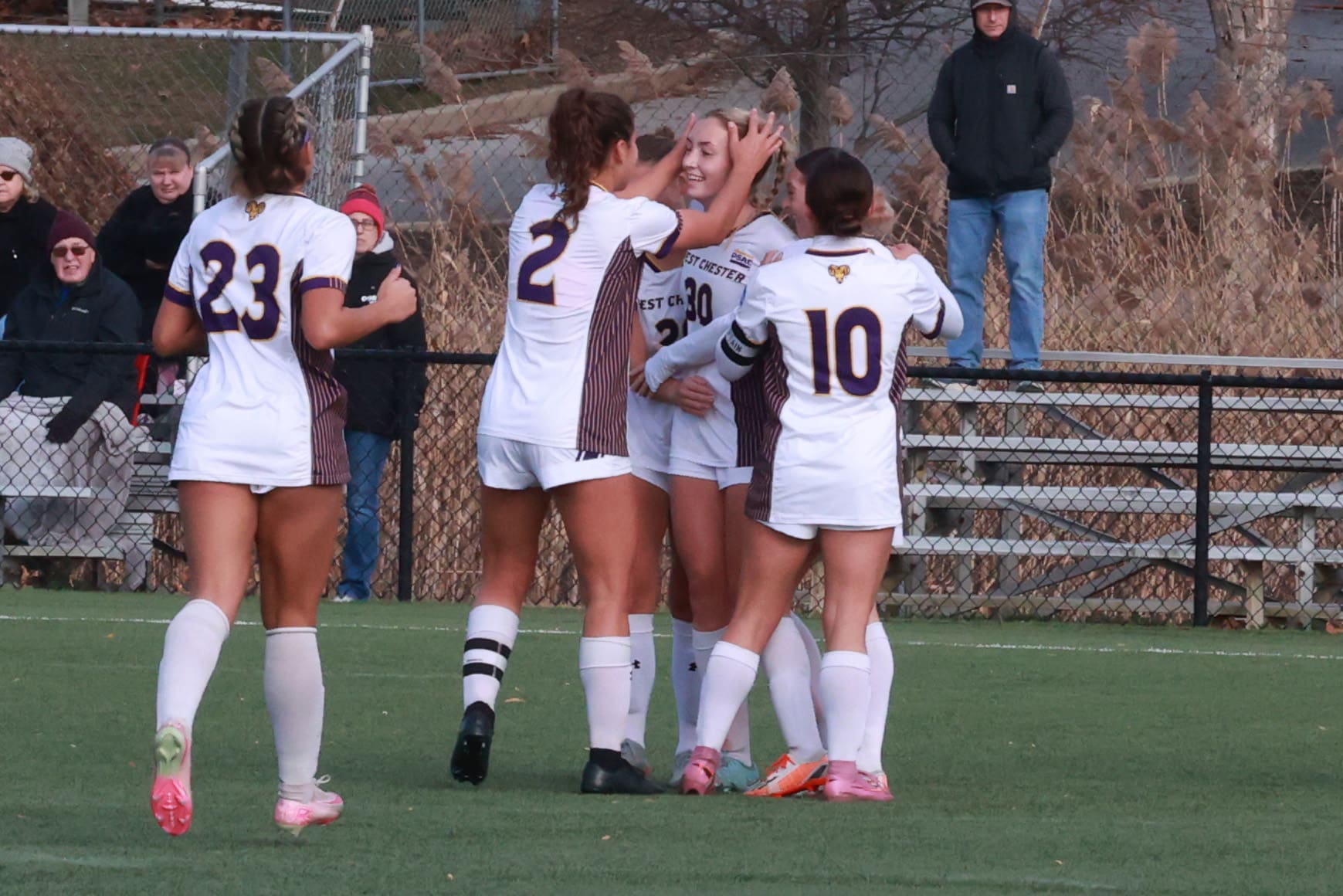 Lindsey Balmer celebrates her first half goal with West Chester teammates in a 2-0 win over Fairmont State on November 15, 2025.