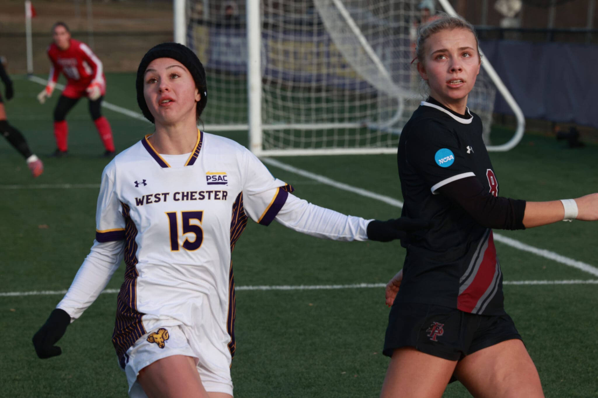 Faith Matter (left) battles with Lindsey Price in a NCAA Division II quarterfinal at West Chester University on December 6, 2025