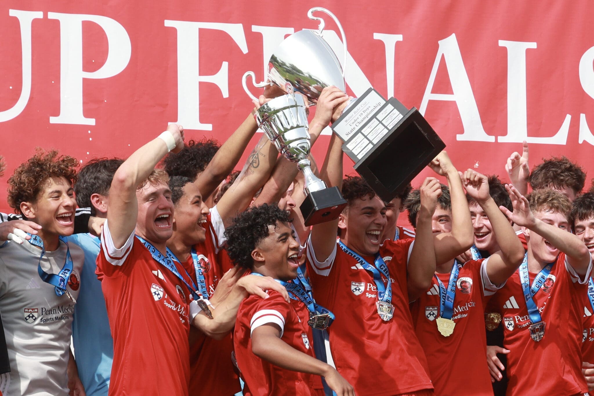 Lancaster FC celebrates with Walter Bahr Trophy