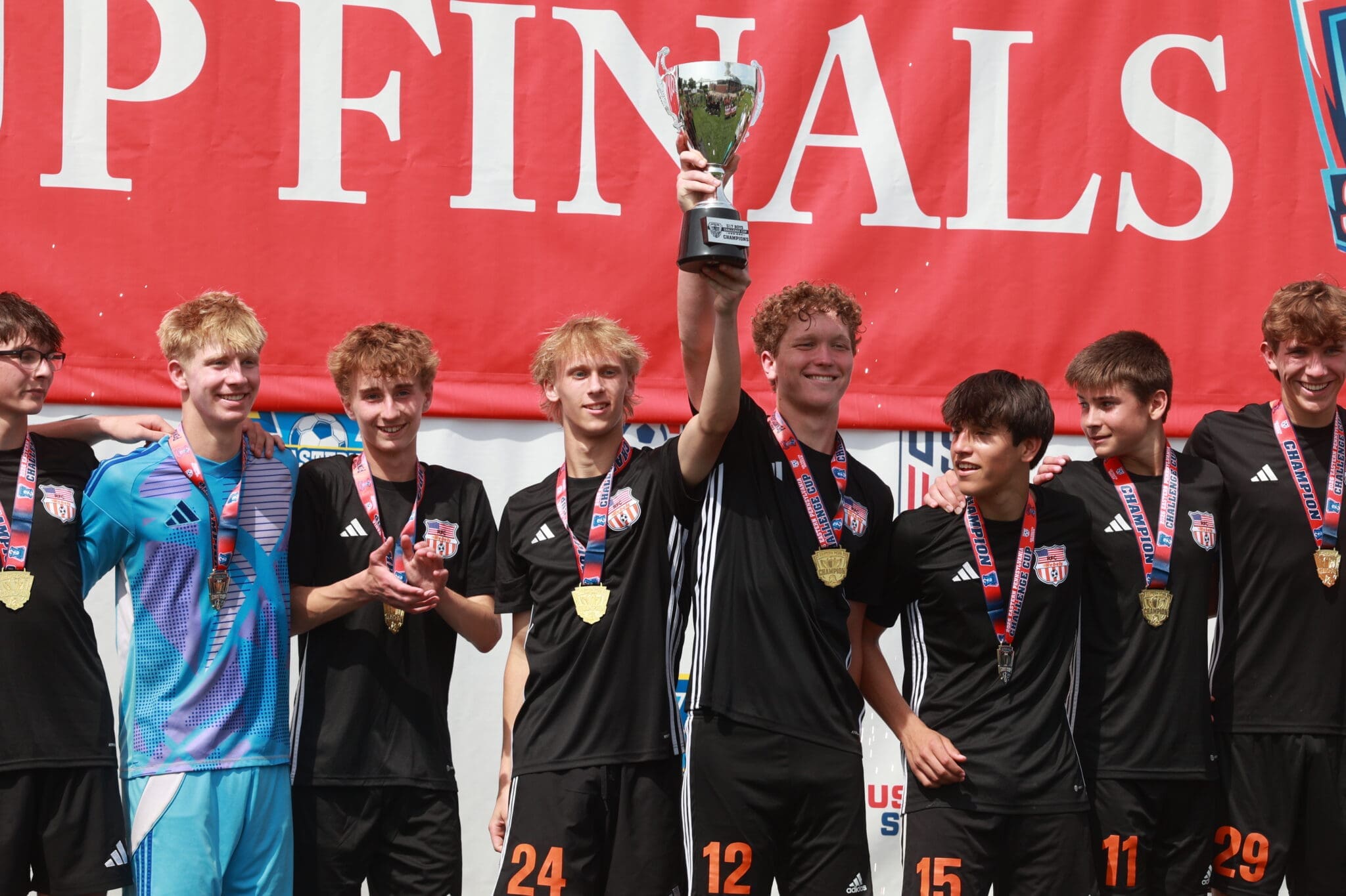 Players from Rebels FC celebrate a state cup win at WSFS Bank Sportsplex on May 17, 2026